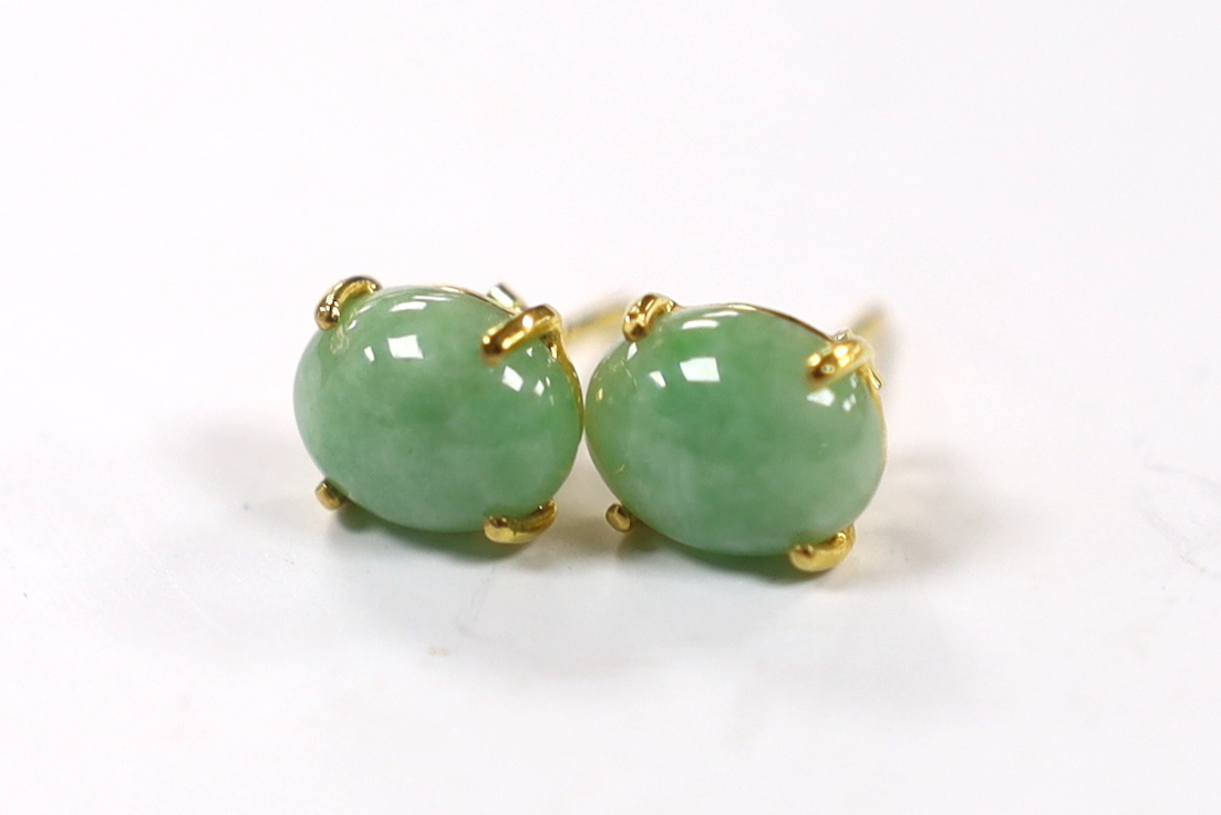 A Chinese 14k yellow metal and jade set baton link necklace, 45cm, gross weight 26.3 grams, together with a pair of 750 yellow metal and cabochon jade set ear studs, gross weight 2.2 grams.